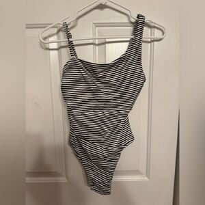 Striped Black and White juniors 
One Piece

Gently used.